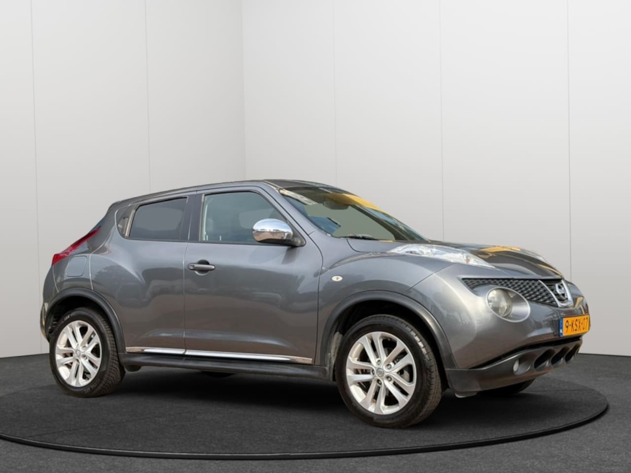 Nissan Juke - 1.6 Tekna | LEER | STOELVERWARMING - AutoWereld.nl