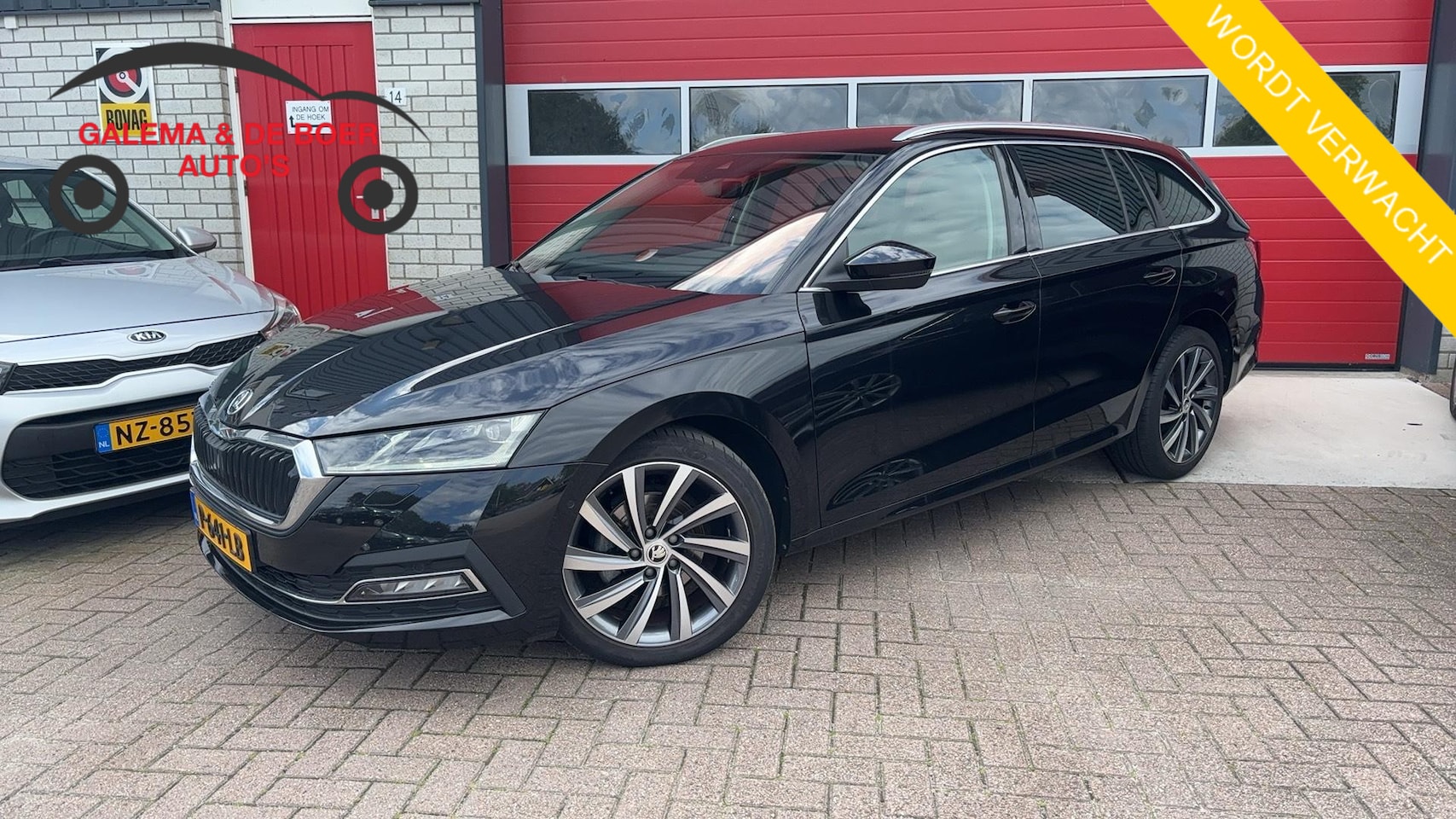 Skoda Octavia Combi - 1.5 e-TSI Business Edition Plus AUTOMAAT / COGNAC LEDER / MATRIX LED / STOELVERW / TREKHAA - AutoWereld.nl