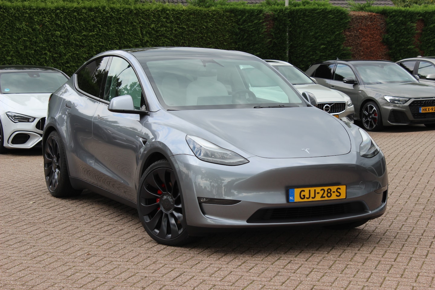 Tesla Model Y - Performance AWD 75 kWh / Hardware 4 / AMD Ryzen / Panoramadak / Camera / 21'' / Stoelverwa - AutoWereld.nl