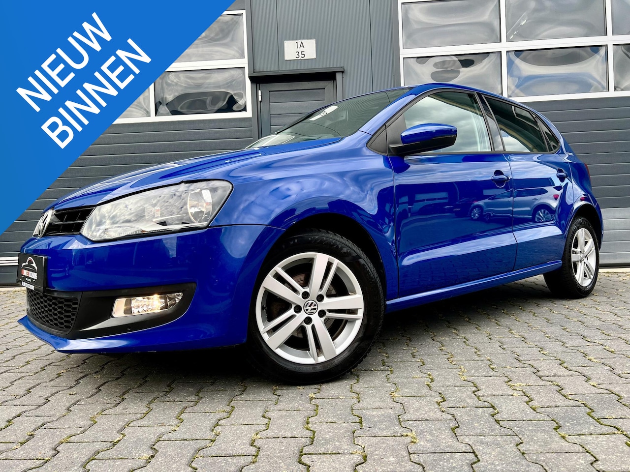 Volkswagen Polo - 1.2 TEAM *CRUISE*CARPLAY*PDC*CLIMA - AutoWereld.nl