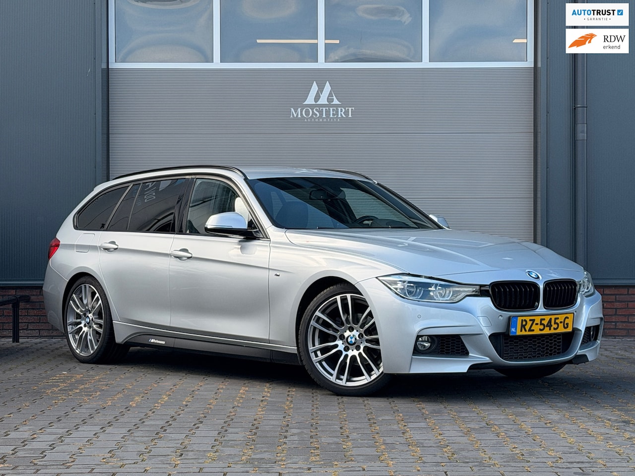 BMW 3-serie Touring - 318i High Executive M-Sport|2018|NAP|Dealer|2x M-pakket|Trekhaak|H&K|Stoelverw.|Elekt. kof - AutoWereld.nl