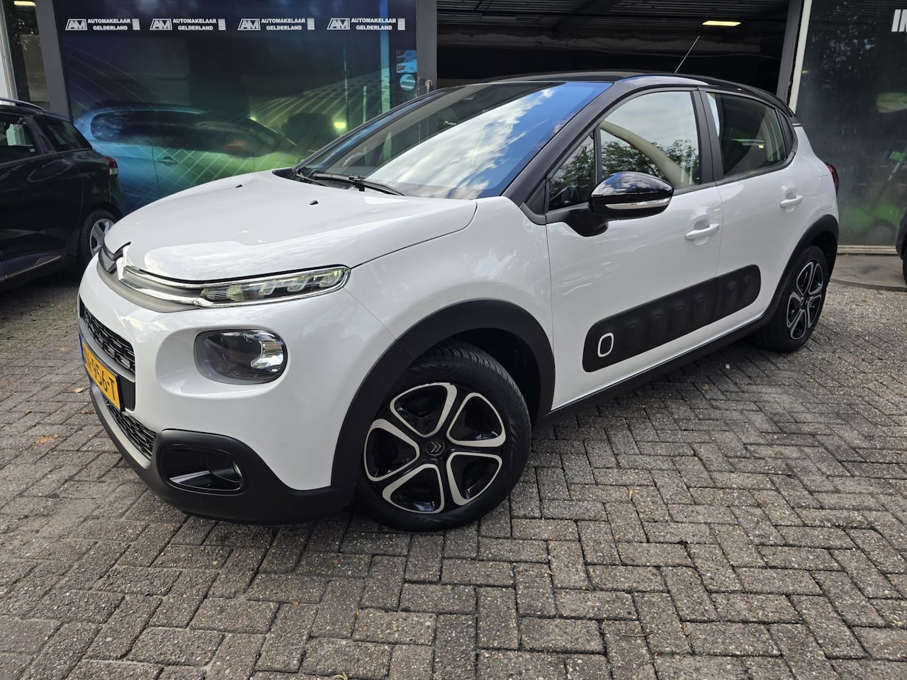 Citroën C3 - 1.2 83PK Feel | 1E EIGENAAR | 3/6 OF 12MND GARANTIE | NAVI | CRUISE | AIRCO | LMV | - AutoWereld.nl