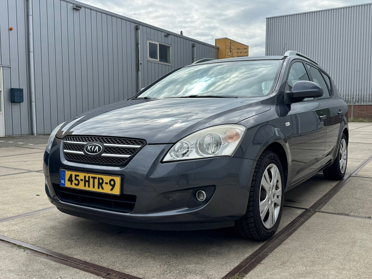 Kia Cee'd Sporty Wagon - 1.4 X-ecutive ISG 1.4 X-ecutive ISG - AutoWereld.nl
