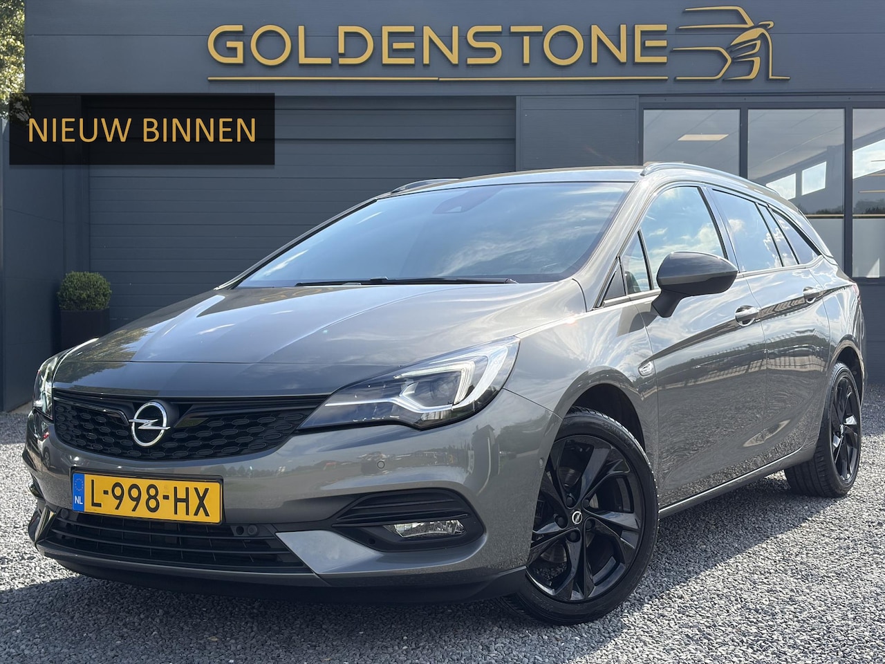 Opel Astra Sports Tourer - 1.2 Ultimate ✓146pk✓Carplay✓Camera✓Stoelverw✓Stuurverw✓Keyless✓Pdc V+A✓Alcantara-Leder✓Cli - AutoWereld.nl
