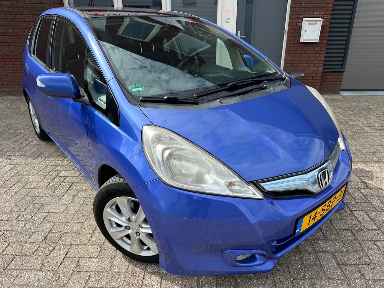 Honda Jazz - 1.4 Hybrid Elegance / Pano / Clima / Cruise / NAP / AUT - AutoWereld.nl