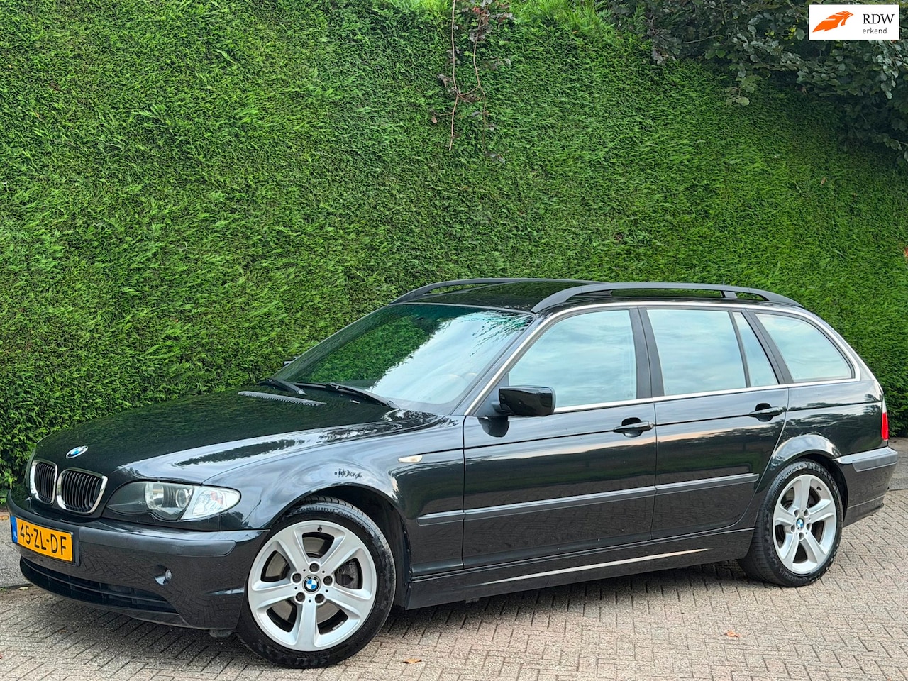BMW 3-serie Touring - 330d Special RIJDNIEUW/DAK/XENON/LEER/1E - AutoWereld.nl