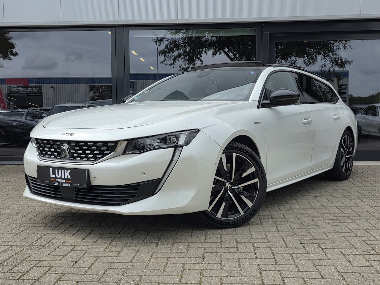 Peugeot 508 SW - 1.6 HYbrid GT + PANO DAK + MASSAGE + VOCAL SOUND + CAMERA - AutoWereld.nl