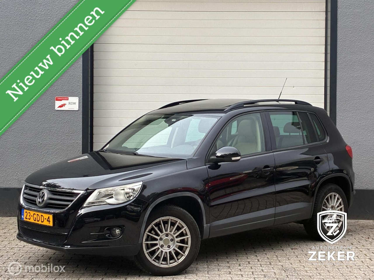 Volkswagen Tiguan - 2.0 TSI 4Motion / AUTOMAAT / PANO / - AutoWereld.nl