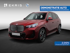BMW iX1 - eDrive20 M Sportpakket Pro | SoH 100% | Premium Pack | Comfort Pack | Stuurwielrand verwar