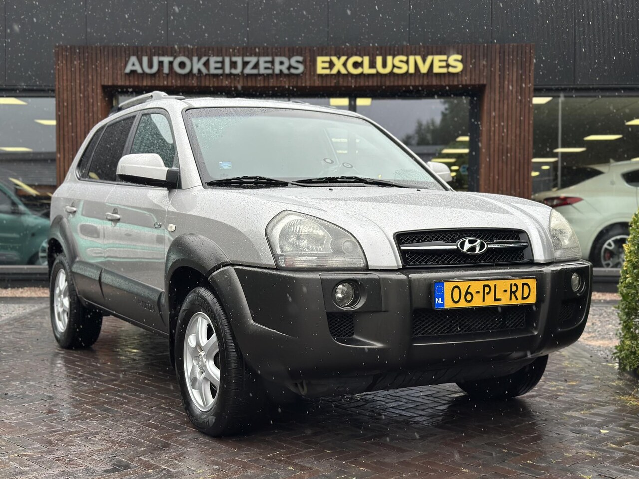 Hyundai Tucson - 2.7i V6 4WD Style Trekhaak Camera Stoelverwarming Leer - AutoWereld.nl