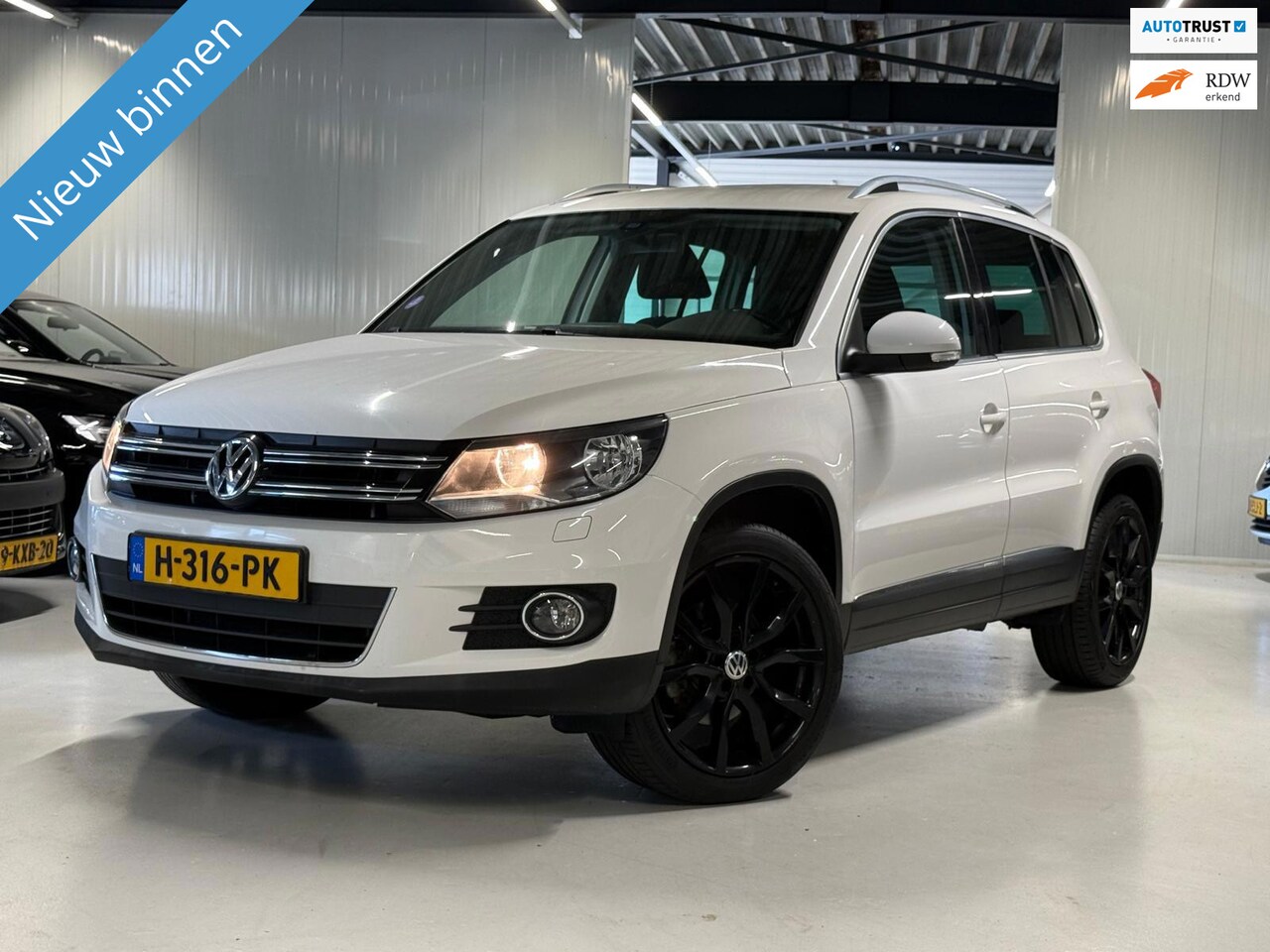 Volkswagen Tiguan - 1.4 TSI 150PK Sport&Style Carplay|Trekhaak! - AutoWereld.nl