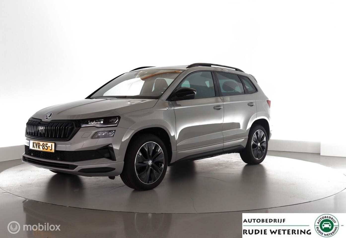 Skoda Karoq - 1.5 TSI ACT 150PK Automaat Sportline Business panoramadak|led|cam|ecc|acc|lmv18 - AutoWereld.nl