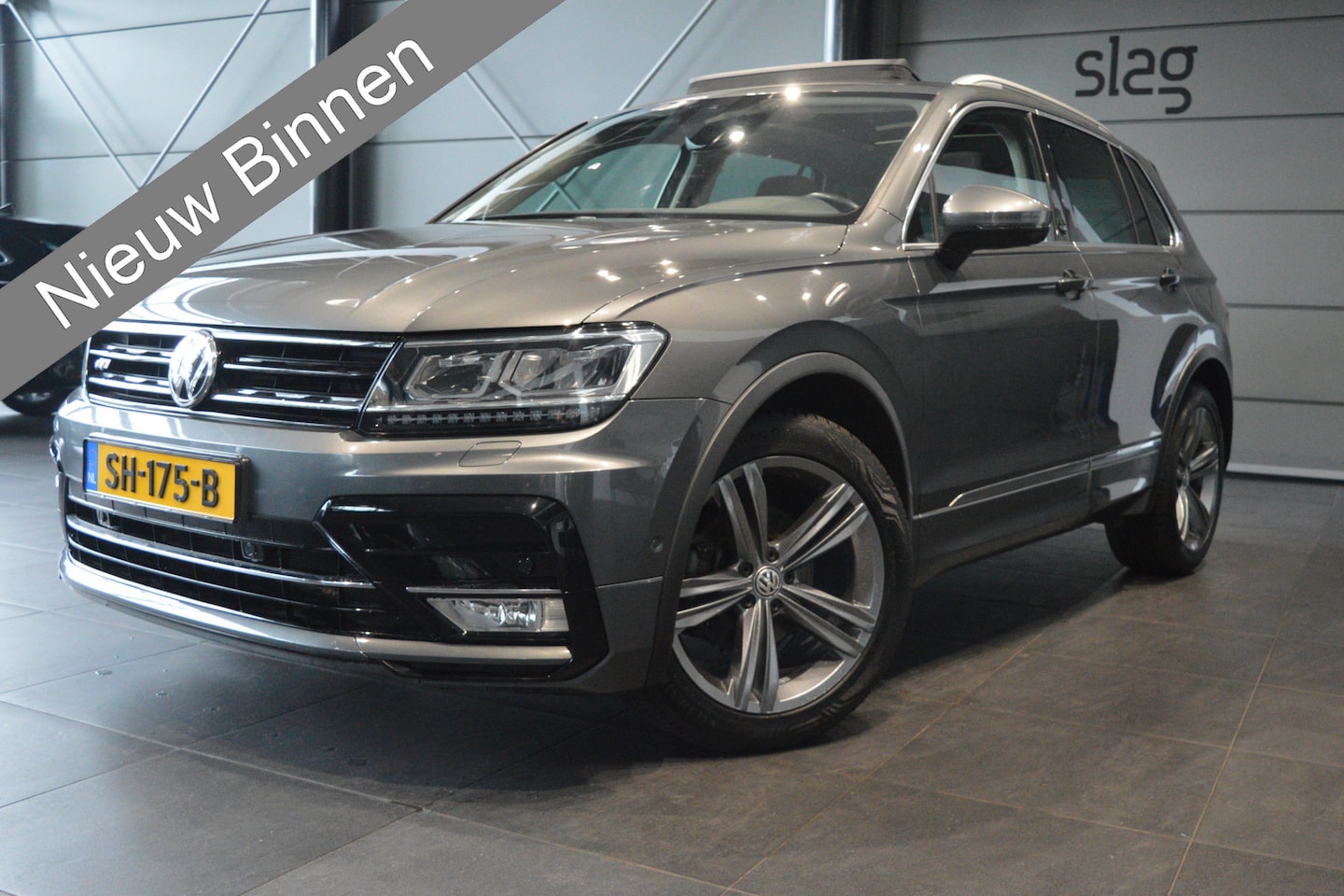 Volkswagen Tiguan - 1.4 TSI ACT R-line navi pano camera trekhaak 150 pk !! - AutoWereld.nl