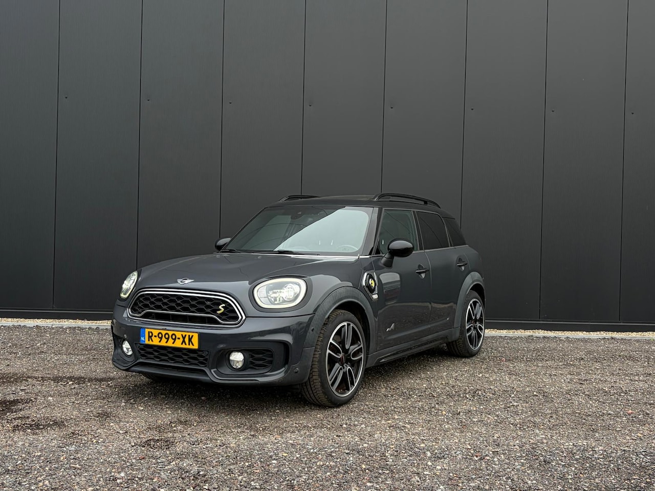 MINI Countryman - 1.5 Cooper S E ALL4 Chili (PANO, JCW, LEDER, STOELVERWARMING, LED) - AutoWereld.nl