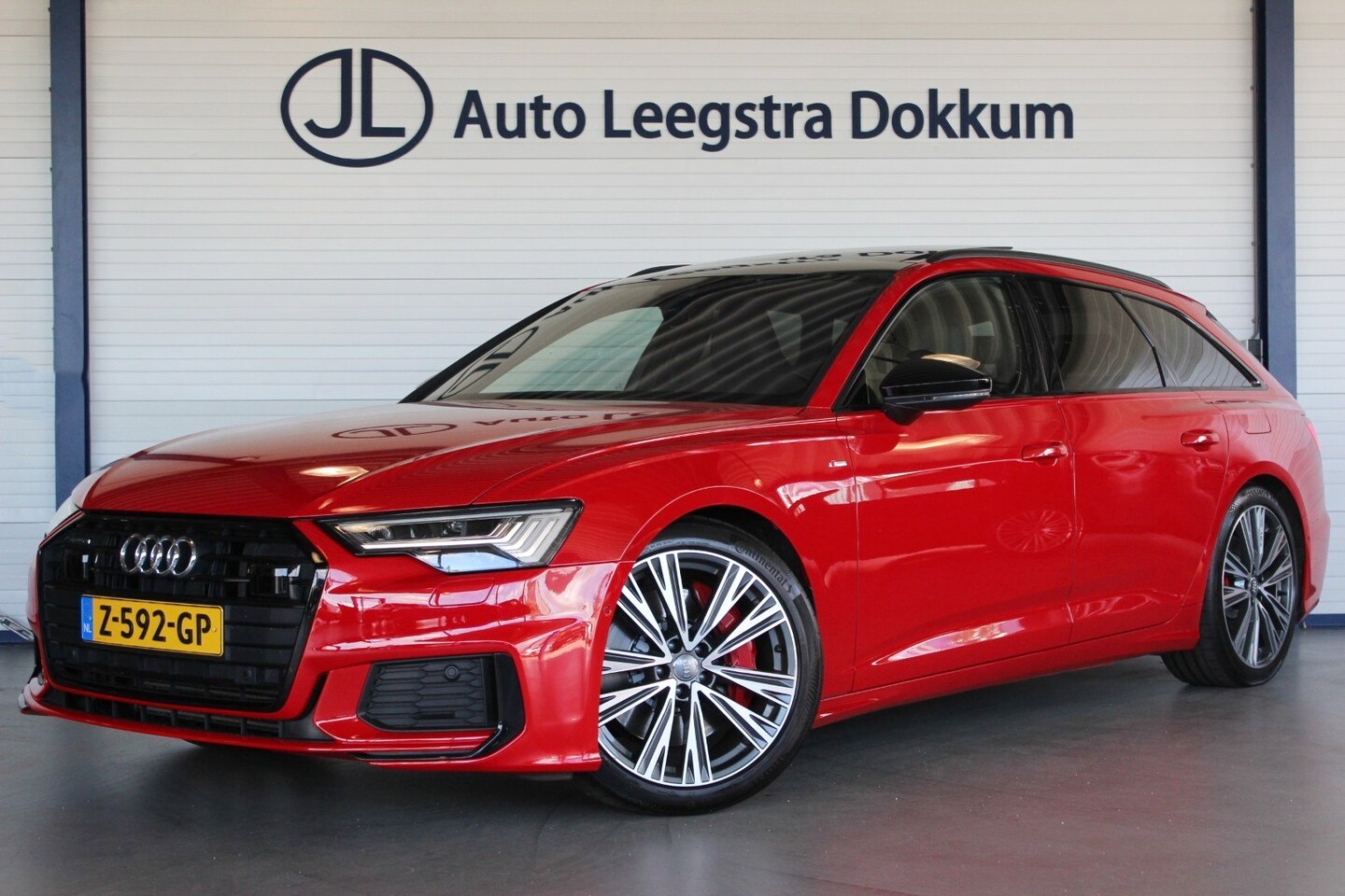 Audi A6 Avant - 55 TFSI e Quattro Competition Tangorot Metallic | RS-stoelen | Black Optic | Head-Up | Cam - AutoWereld.nl
