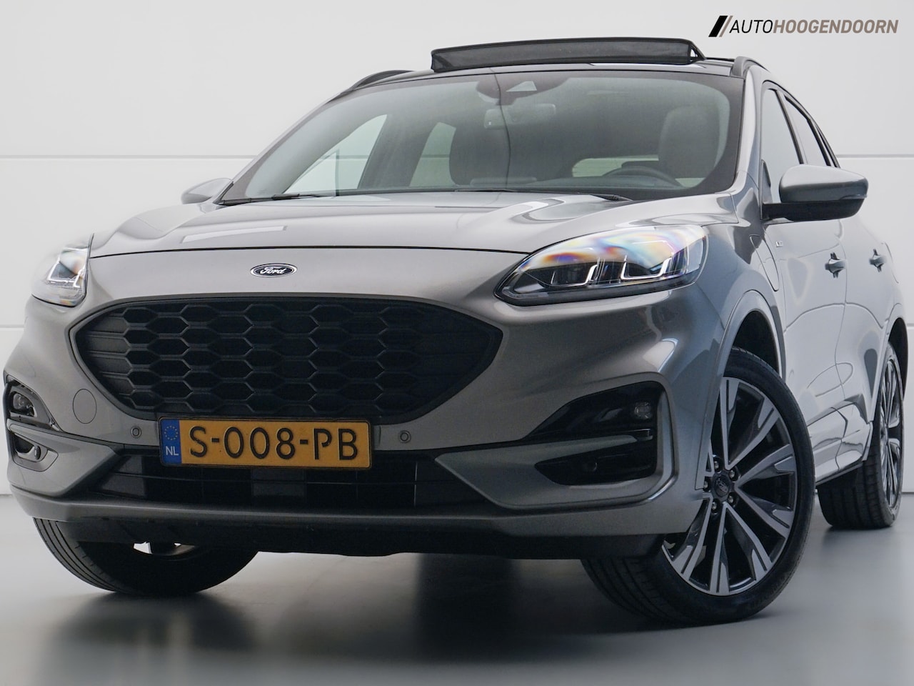 Ford Kuga - 2.5 PHEV ST-Line X (APPLE CARPLAY,TREKHAAK,PANORAMADAK,B&O,STUUR-STOELVERWARMING,ELEKTRISC - AutoWereld.nl