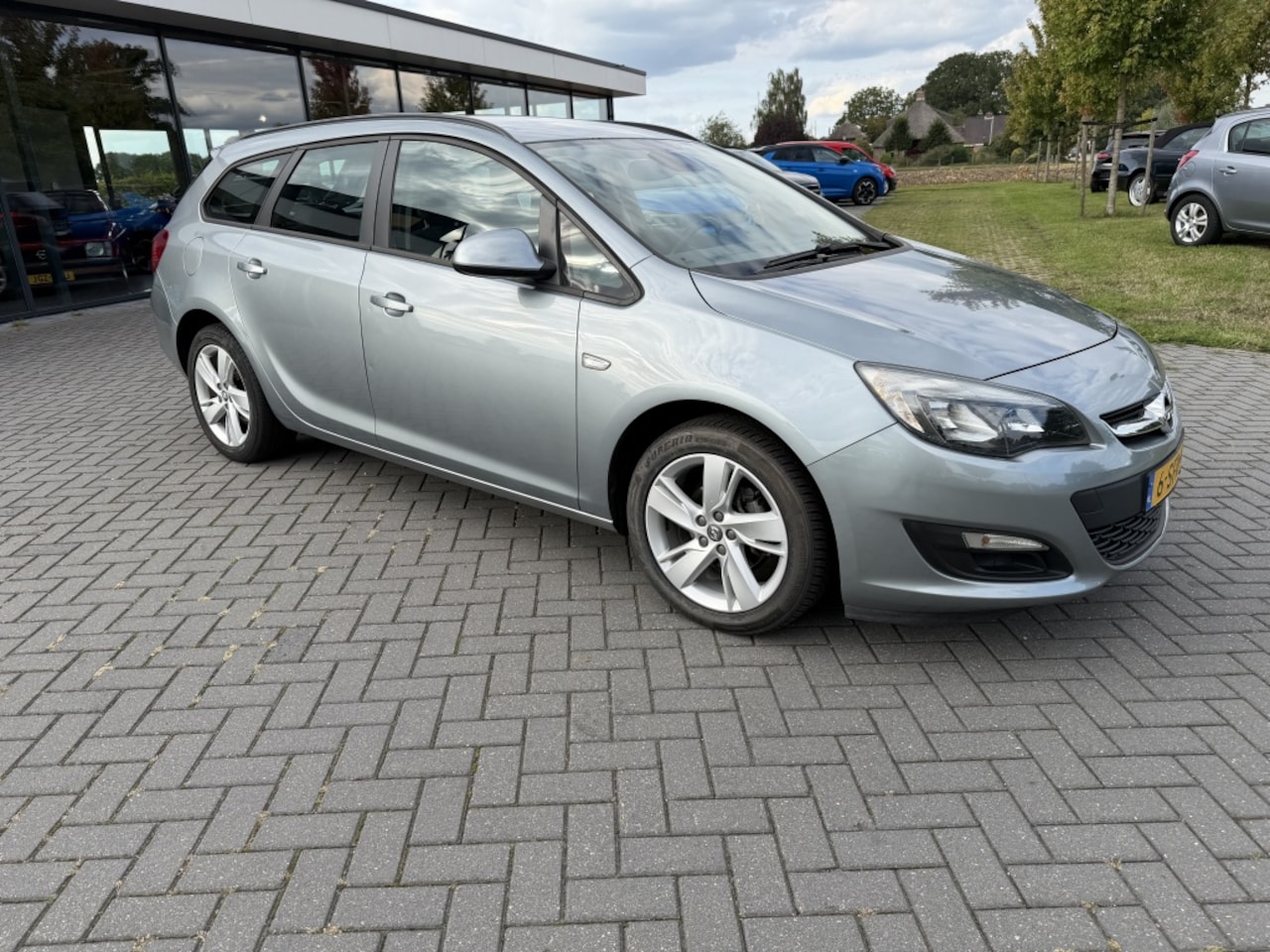 Opel Astra Sports Tourer - 1.4 Turbo Rhythm 1.4 Turbo Rhythm - AutoWereld.nl