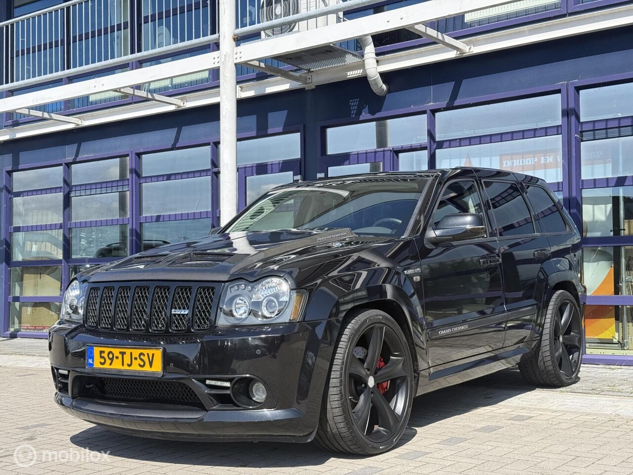 Jeep Grand Cherokee - 6.1 V8Hemi SRT-8| Supercharged|600PK|NAP - AutoWereld.nl