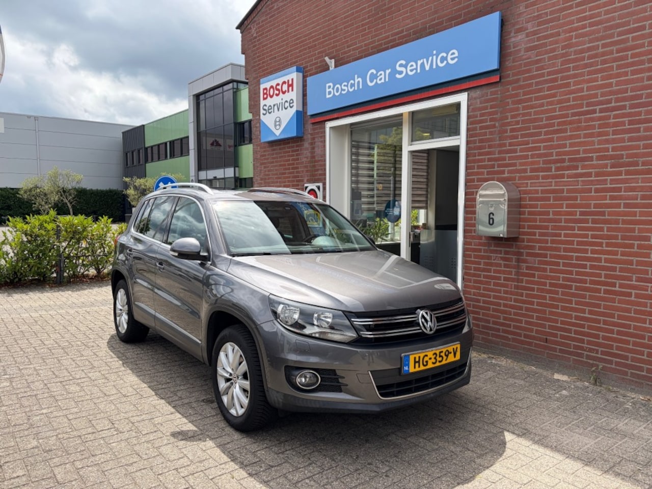 Volkswagen Tiguan - 1.4 TSI 90kW BMT Panoramadak - AutoWereld.nl