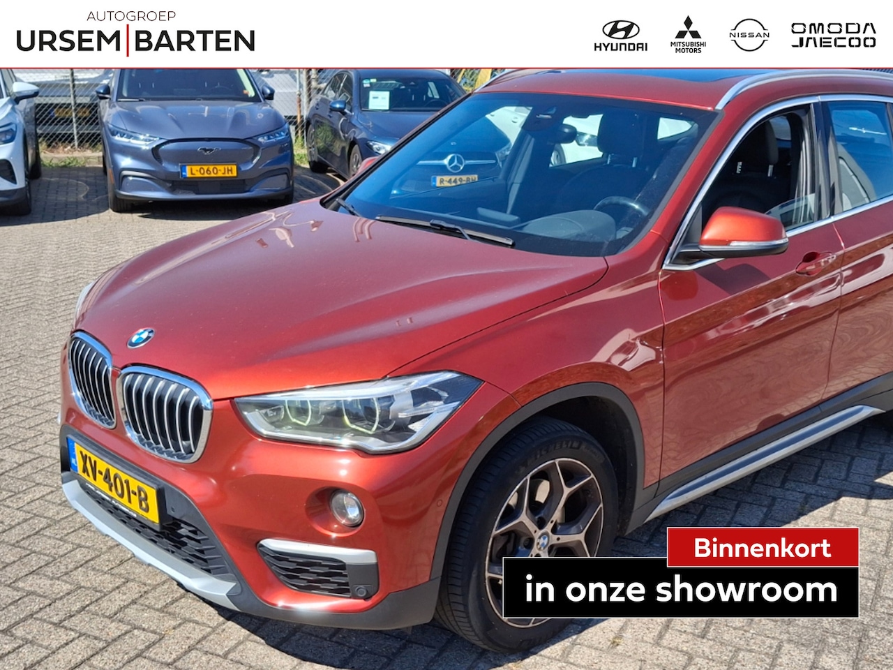 BMW X1 - sDrive20i Orange Edition III | Trekhaak met afneembare kogel - AutoWereld.nl