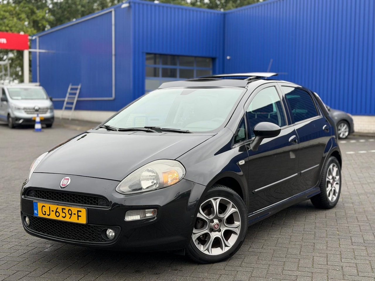 Fiat Punto Evo - 0.9 TwinAir Lounge/Pano/Clima/Cruise/Navi/LMV/NAP - AutoWereld.nl