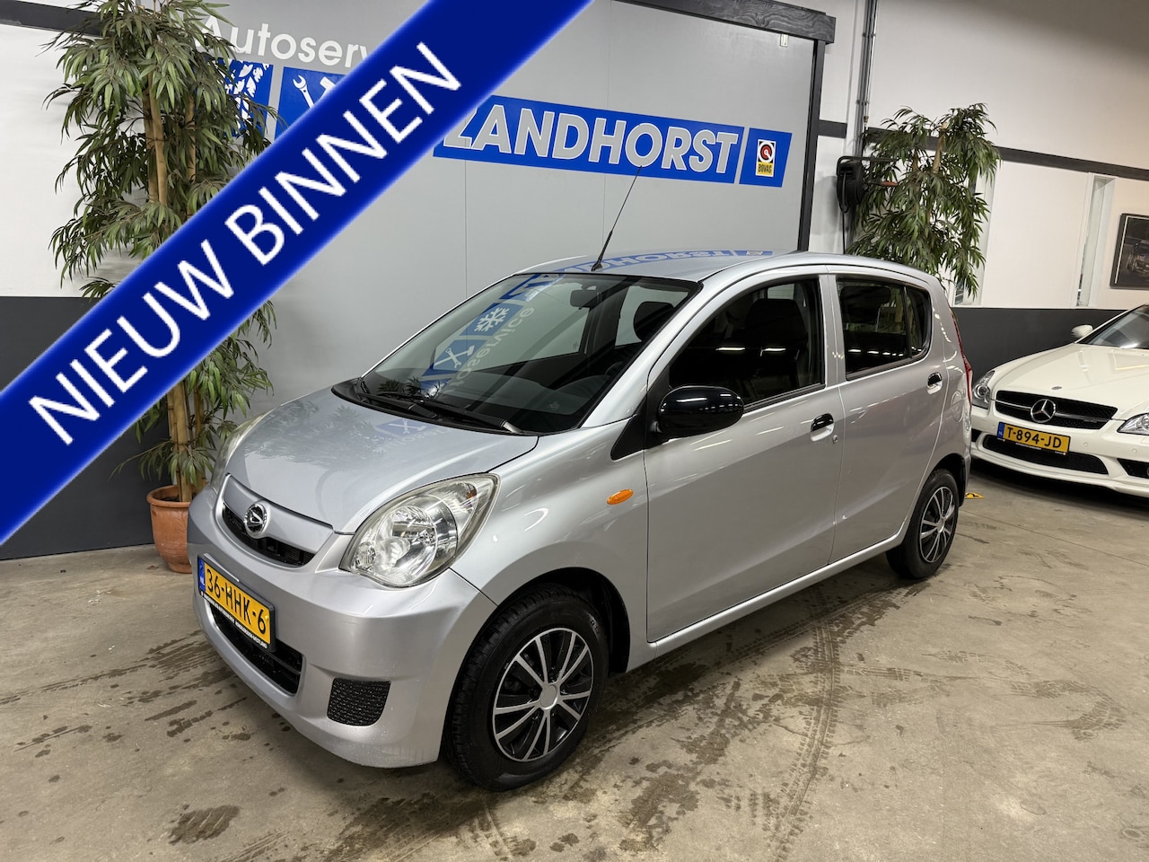 Daihatsu Cuore - 1.0 Trend // Autom. // Airco - AutoWereld.nl