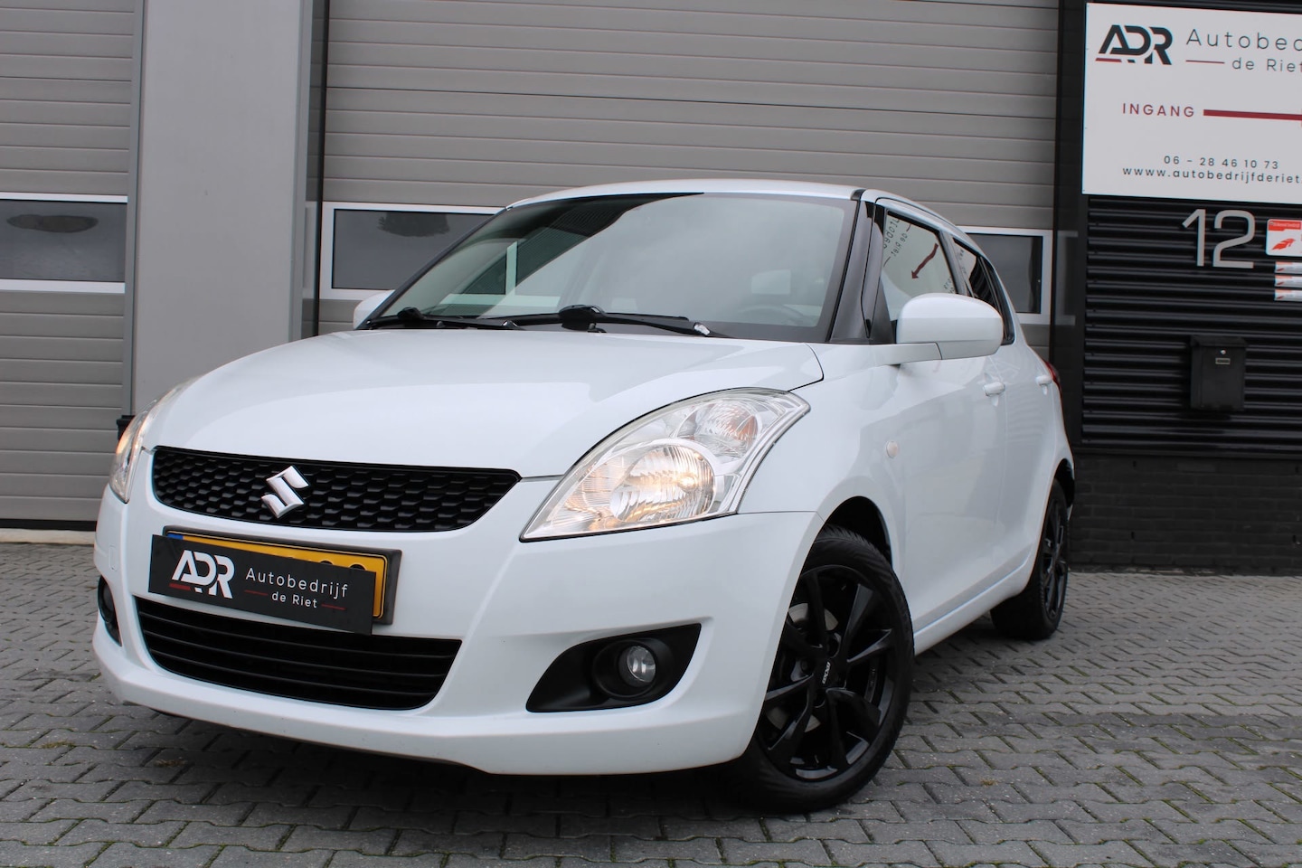 Suzuki Swift - 1.2 Exclusive|CRUISE|AIRCO|16"LM VELGEN|NETTE STAAT - AutoWereld.nl