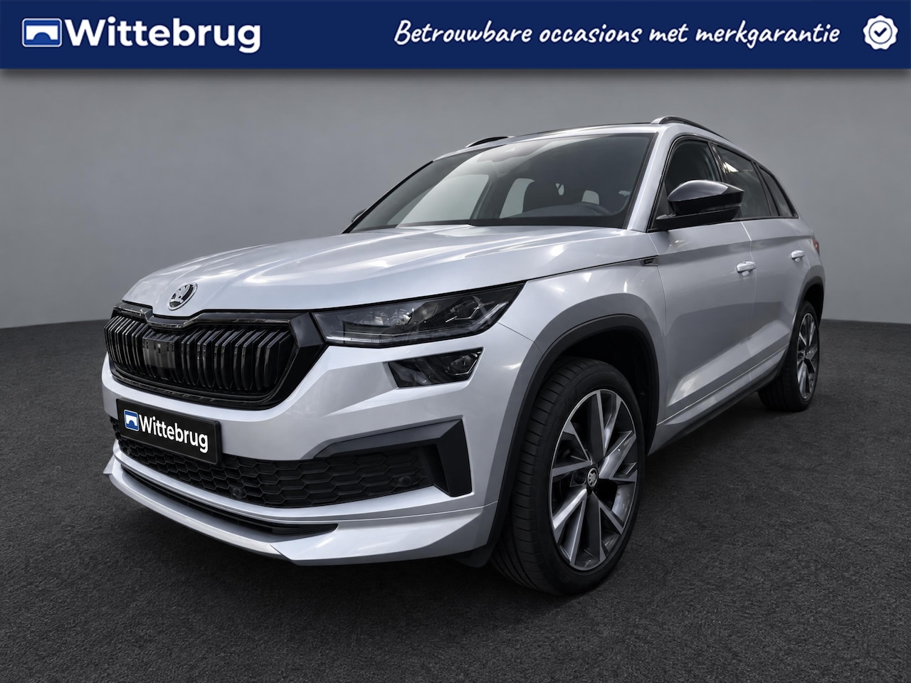 Skoda Kodiaq - 1.5 TSI Sportline Business DSG Automaat 20"LM Velgen / Zwenkbare trekhaak / Functiepakket - AutoWereld.nl