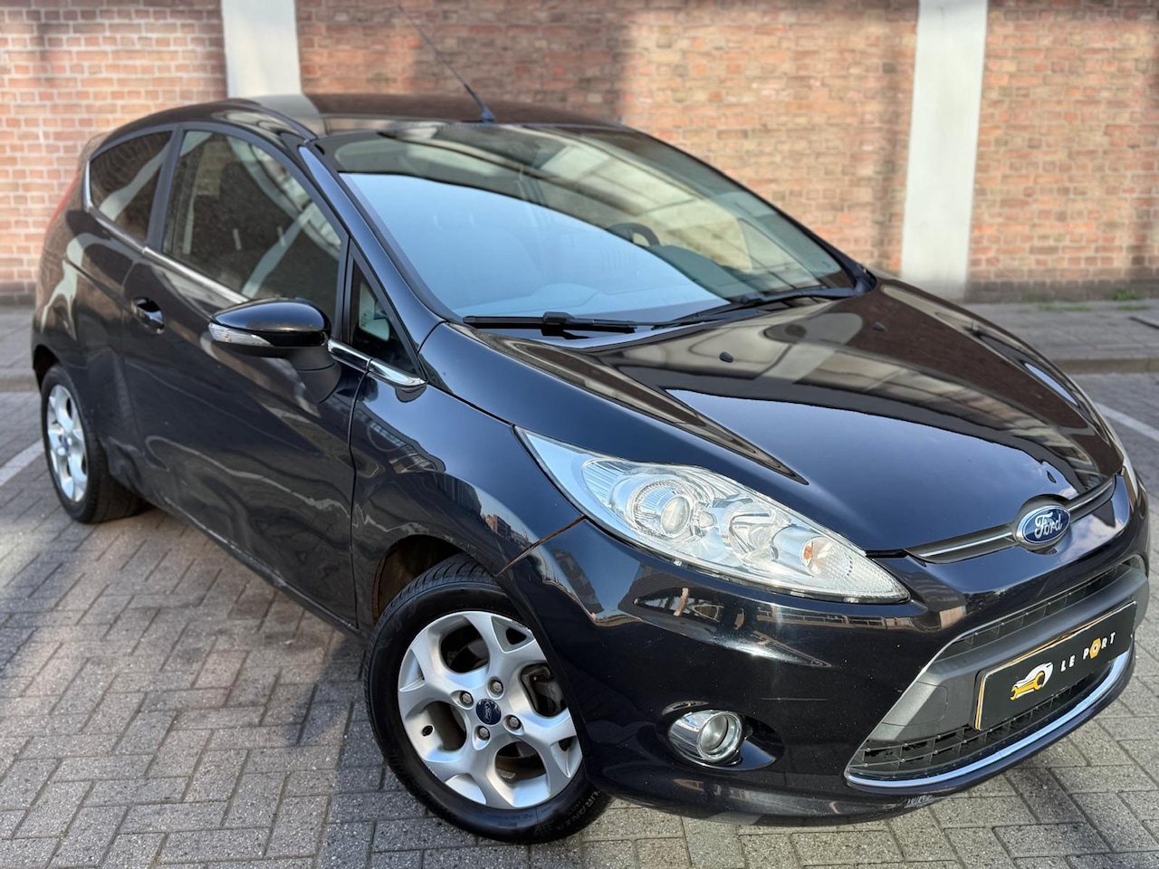 Ford Fiesta - 1.25 Titanium 2009 AIRCO NAVI BLUETHOOTH INGERUILD! - AutoWereld.nl
