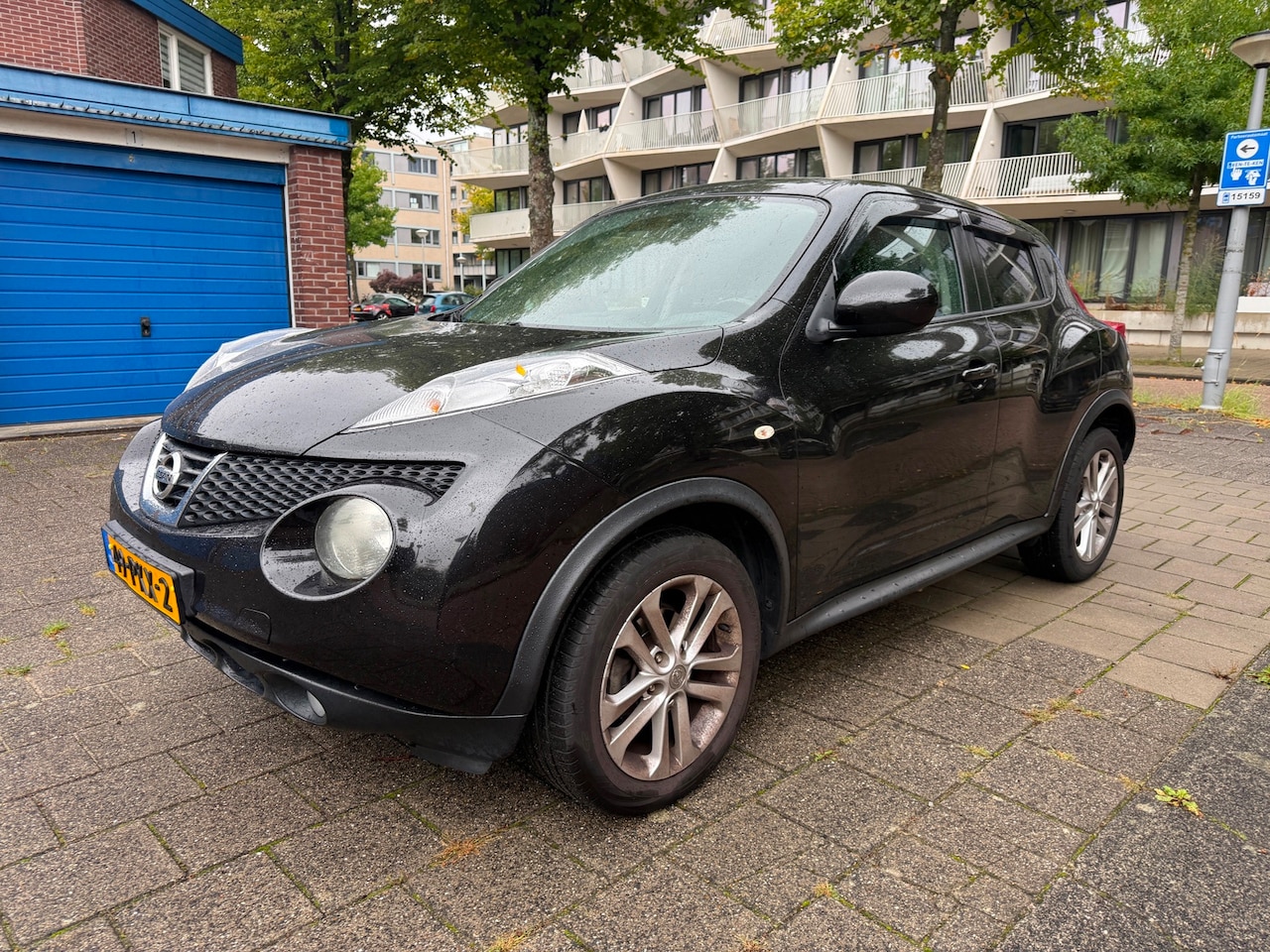 Nissan Juke - 1.6 Acenta Eco Cruise Airco Camera Black Edition - AutoWereld.nl