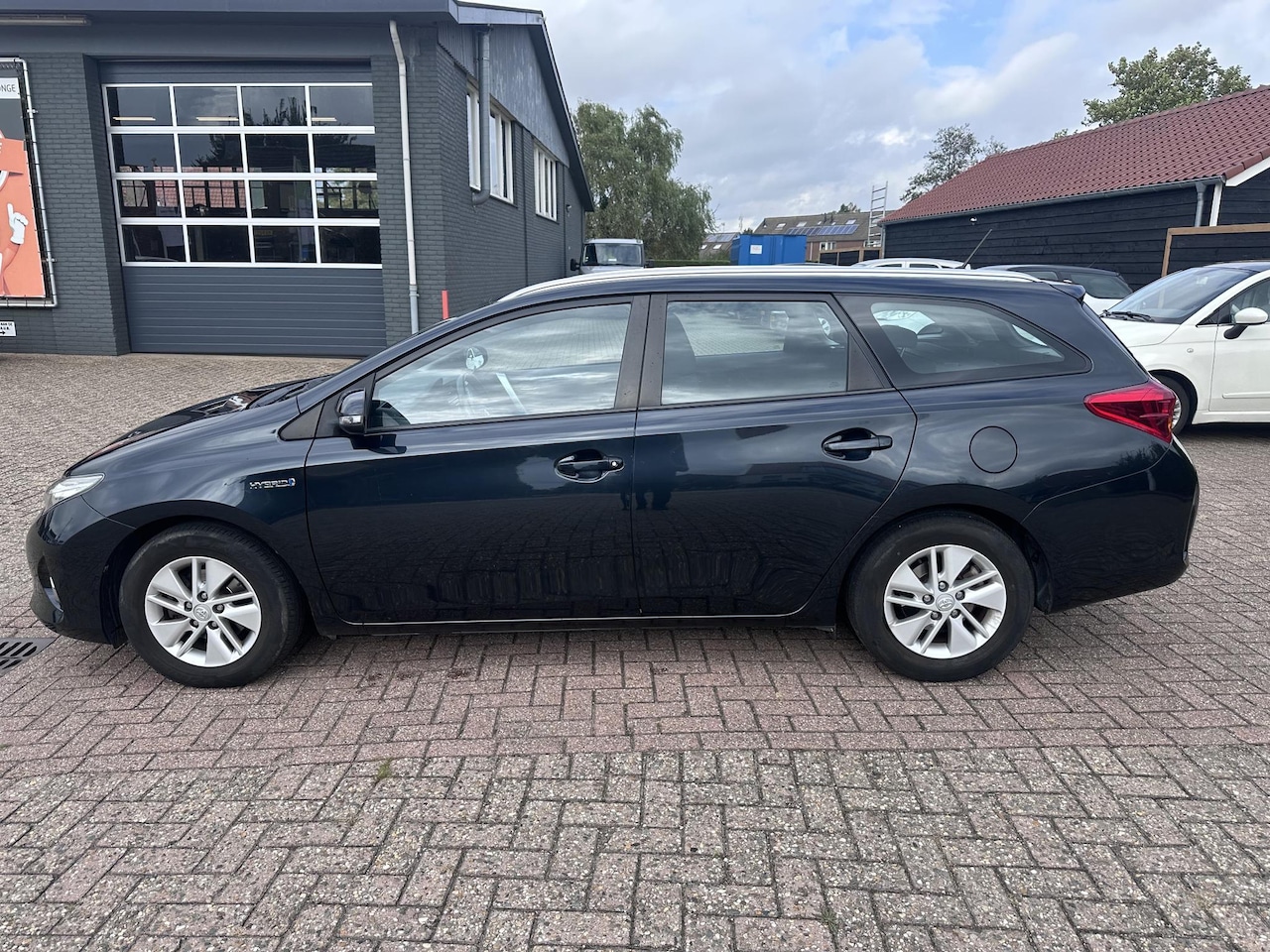 Toyota Auris Touring Sports - 1.8 Hybrid Aspiration 1.8 Hybrid Aspiration - AutoWereld.nl