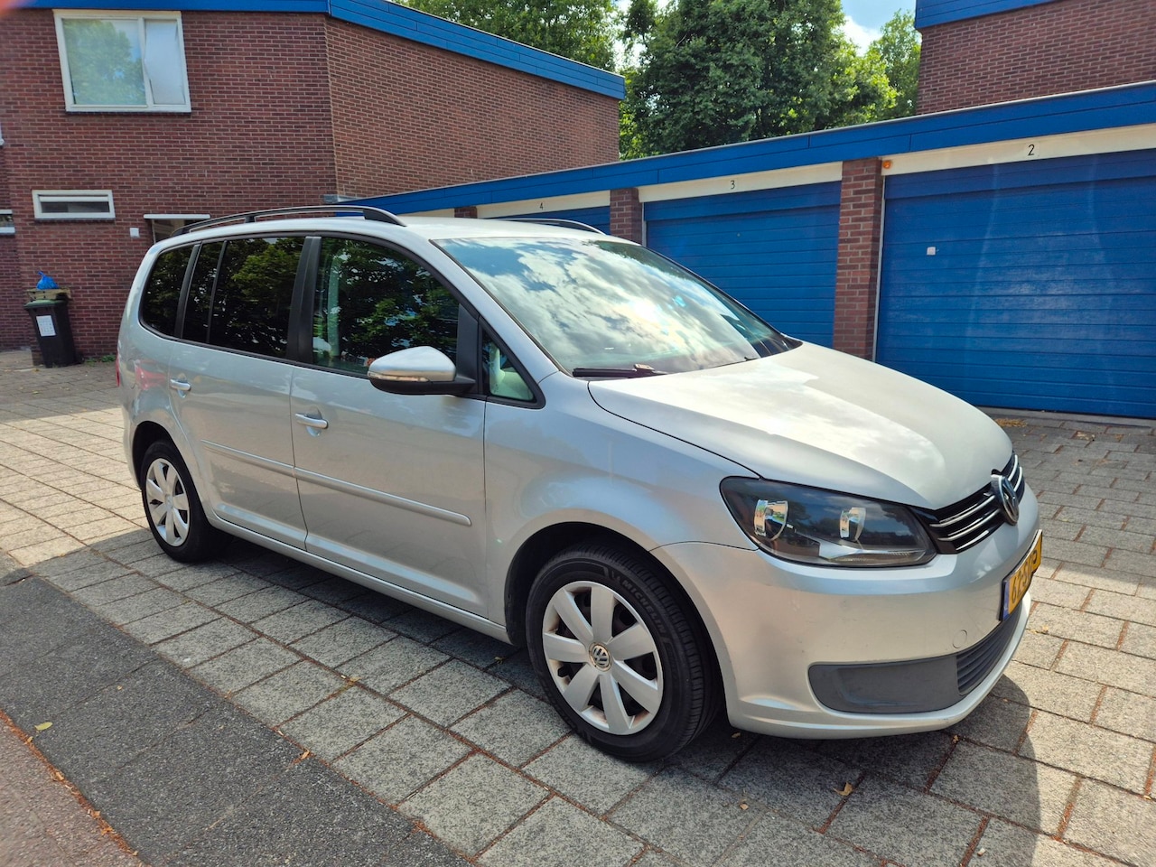 Volkswagen Touran - 1.2 TSI Comfortline BlueMotion 7p. 1.2 TSI Comfortline BlueMotion 7p. NW APK - AutoWereld.nl