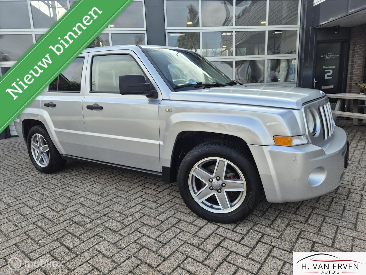 Jeep Patriot - 2.4 Sport NAVI CRUISE TREKHAAK NAP - AutoWereld.nl