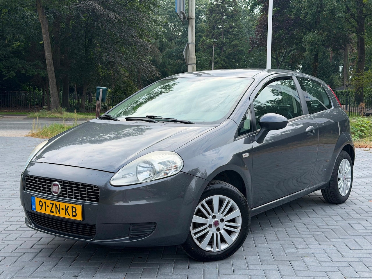 Fiat Grande Punto - 1.4 Dynamic/Airco/Cruise/LMV/NAP/Elekt Raam - AutoWereld.nl