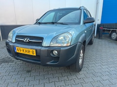 Hyundai Tucson - 2.0i 141pk Dynamic / Airco / Trekhaak max. 1.400kg / Cruise control / LM 16"/ Compleet ond