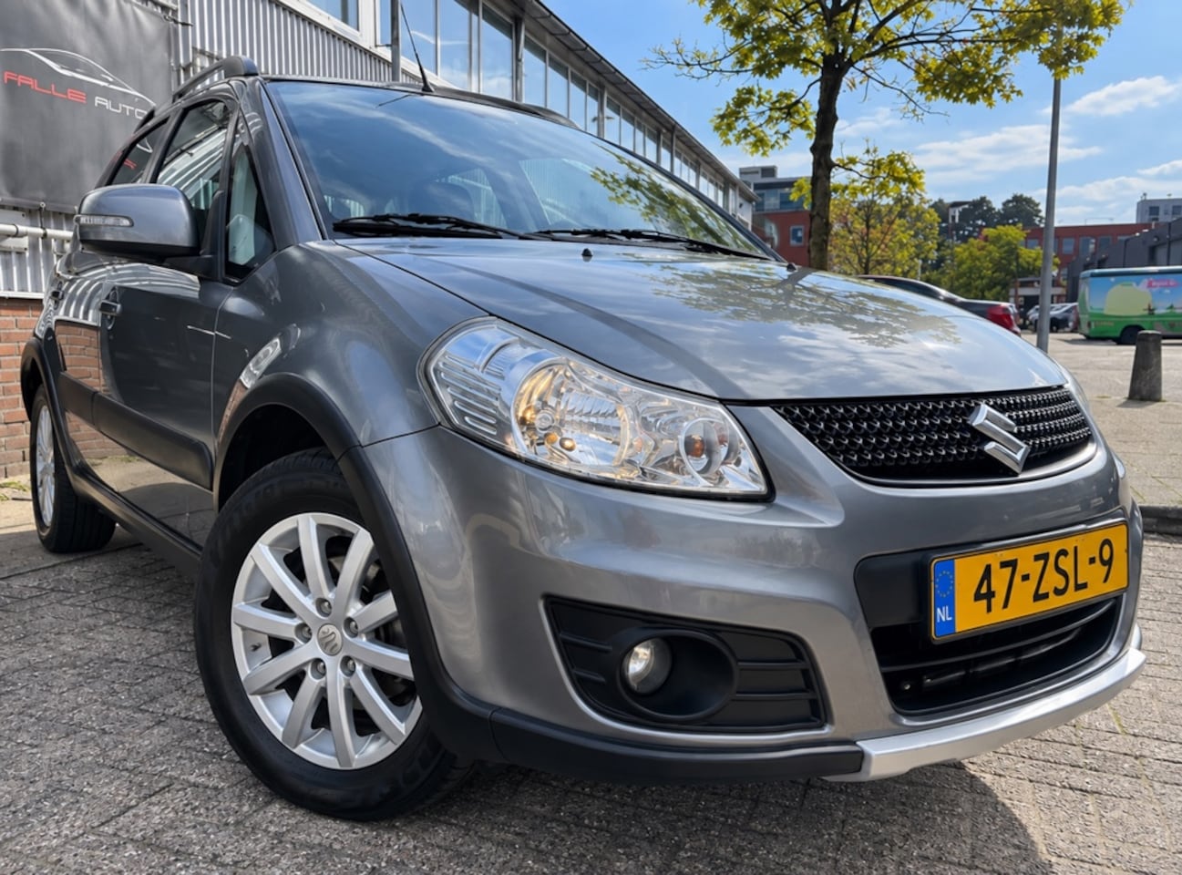 Suzuki SX4 - 1.6 Executive keyless clima trekhaak navi - AutoWereld.nl