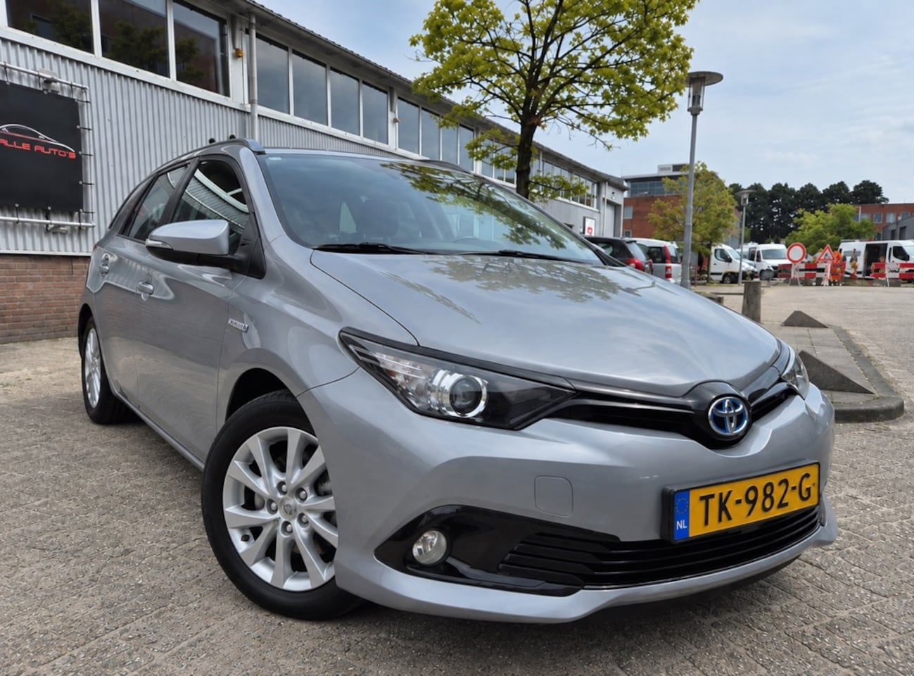 Toyota Auris Touring Sports - 1.8 Hybrid 16'LMV KLIMA CRUISE - AutoWereld.nl