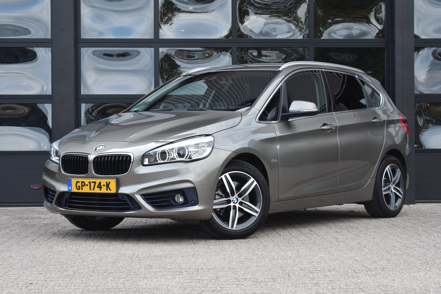 BMW 2-serie Active Tourer - 218i Sport '15 LED Clima Navi Cruise Inruil mogelijk - AutoWereld.nl