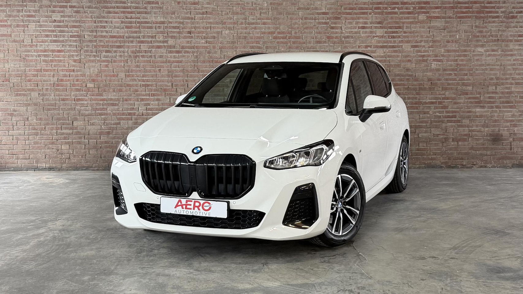 BMW 2-serie Active Tourer - 220i Camera / Navi / CarPlay / DAB - AutoWereld.nl