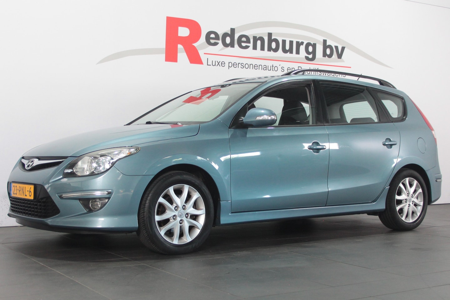 Hyundai i30 CW - 1.6i i-Motion - Airco / Cruise / Stuurbed. - AutoWereld.nl