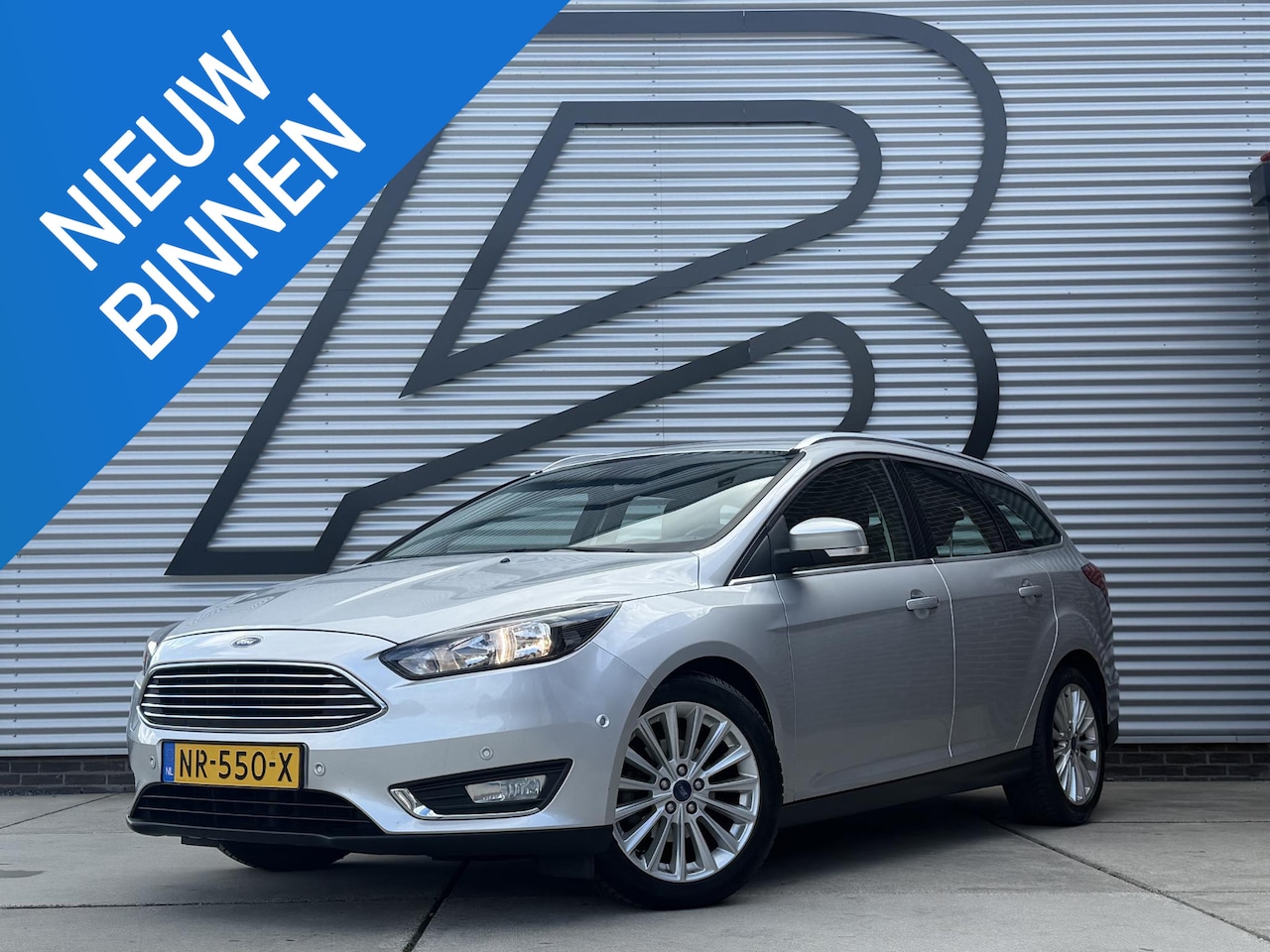 Ford Focus Wagon - 1.0 Titanium 2e Eigenaar|Navi|Clima|Cruise|PDC V+A|Trekhaak|N.A.P|APK tot 03-2027 - AutoWereld.nl