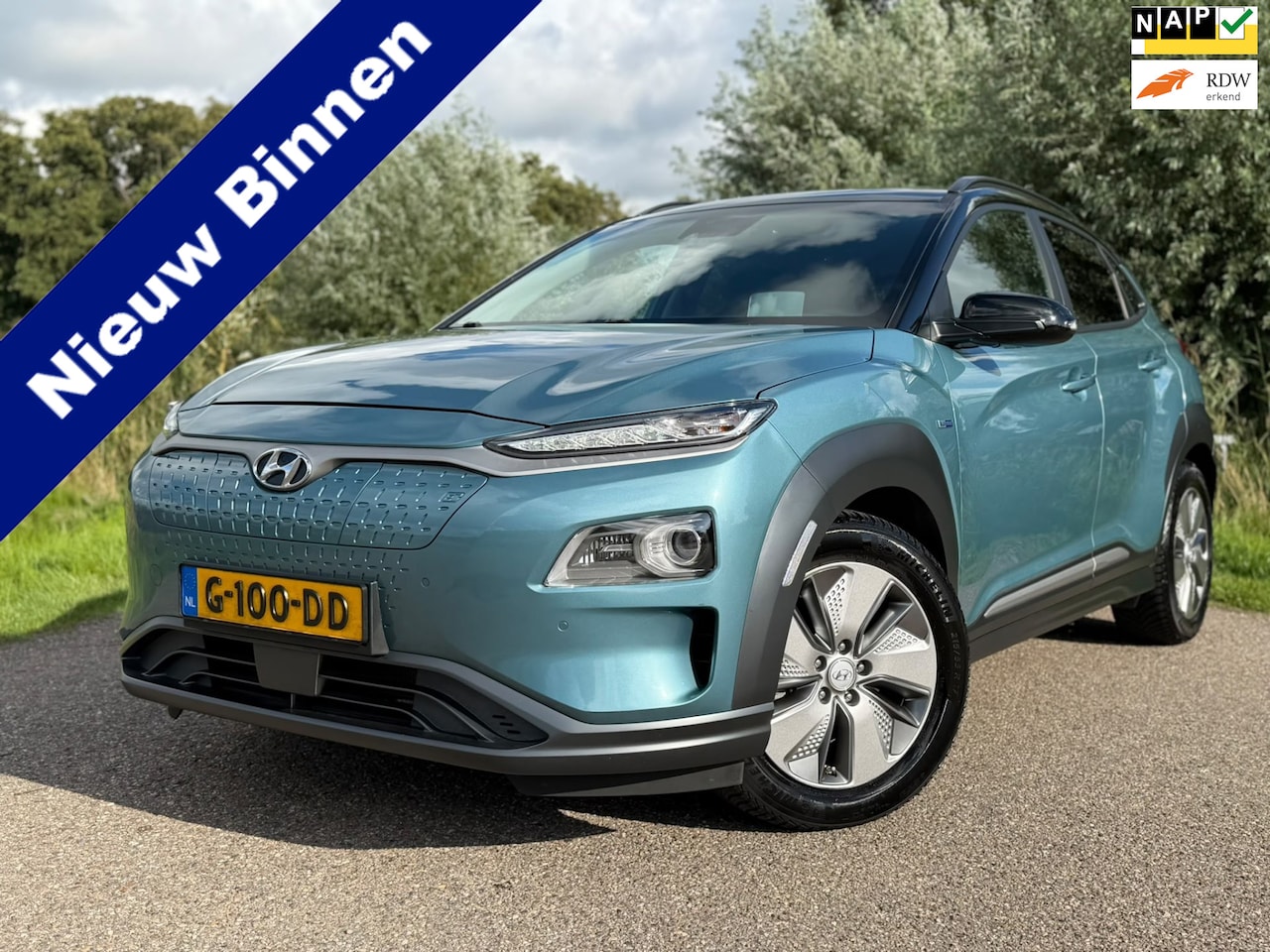 Hyundai Kona Electric - EV Premium 64 kWh Long Range / SoH 97.8% / Automaat / Camera / Stoelverwarming - Airco / L - AutoWereld.nl