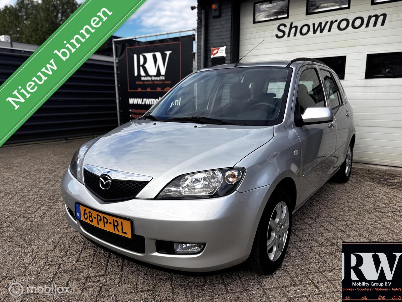 Mazda 2 - 1.4 Dynamic *NAP*AIRCO*TREKHAAK*NIEUWE APK* - AutoWereld.nl