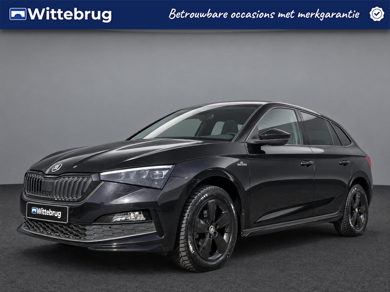 Skoda Scala - 1.5 TSI Sport Business / Panoramadak / Virtual Cockpit / Navigatie / Trekhaak Wegklapbaar - AutoWereld.nl
