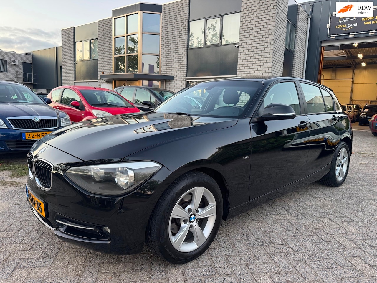 BMW 1-serie - 116i Sport 1ste Eig Airco Navi Cruise Control - AutoWereld.nl