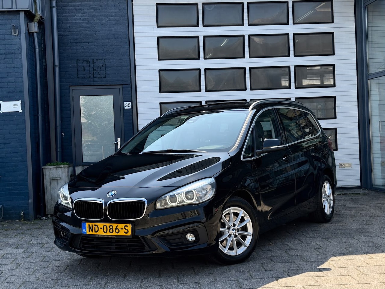 BMW 2-serie Gran Tourer - 218i Centennial High Executive 7P | Clima | Cruise - AutoWereld.nl