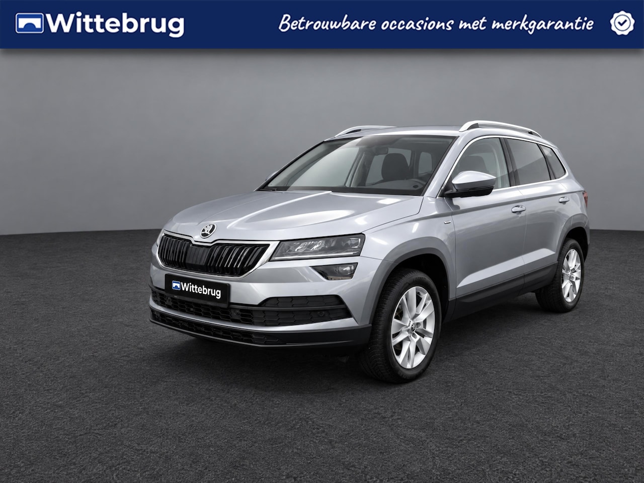 Skoda Karoq - 1.0 TSI Ambition Clever / Navigatie / Led verlichting / 17"LM velgen HAL - AutoWereld.nl