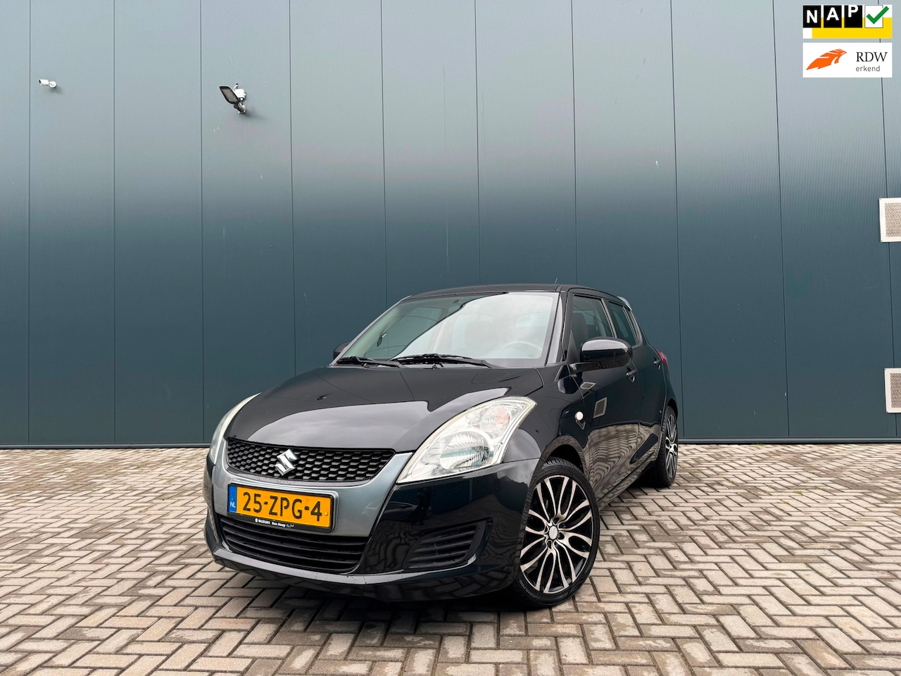 Suzuki Swift - 1.2 Comfort EASSS Sport-Line AIRCO | NAP | CRUISE | STOELVERWARMING - AutoWereld.nl