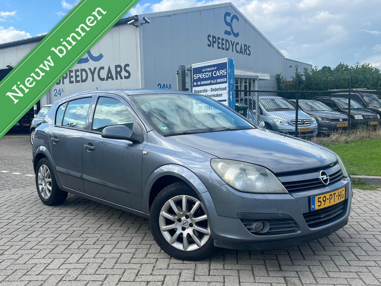Opel Astra - 1.6 Cosmo 5DRS Cruise Airco Elektr Ramen - AutoWereld.nl
