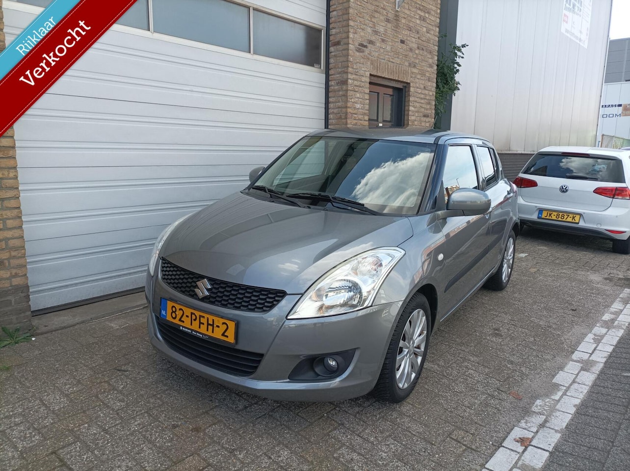 Suzuki Swift - 1.2 Exclusive Clima/Keyless/Trekhaak APK 08-2027 - AutoWereld.nl